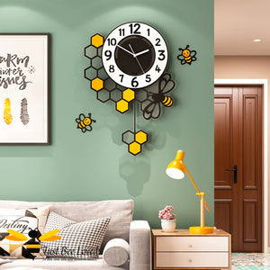 large honeycomb and bee pendulum wall clock with wall decor bees.  