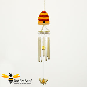 Hand crafted gold coloured metal chimes and glass resin beehive and bee windchime suncatcher