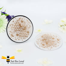 Load image into Gallery viewer, set of two glass mirrored candle plates decorated with golden honeycomb and bees