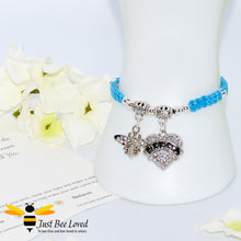Load image into Gallery viewer, handmade blue Shamballa wish charm bracelet for grandmother nana featuring a bee and love heart engraved with &quot;Nana&quot; with sentimental verse card
