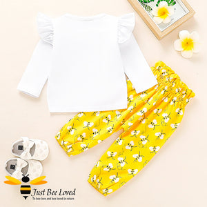 Baby girl fashionable 2 piece set featuring a white long sleeved top with "One Bee" print matched with lovely harem styled bees printed yellow trousers.