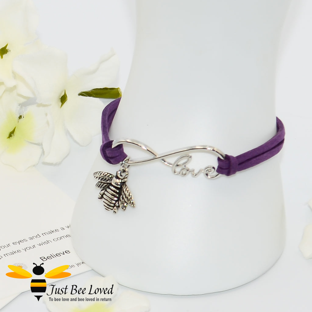 purple faux suede leather bracelet featuring a bee charm with love link