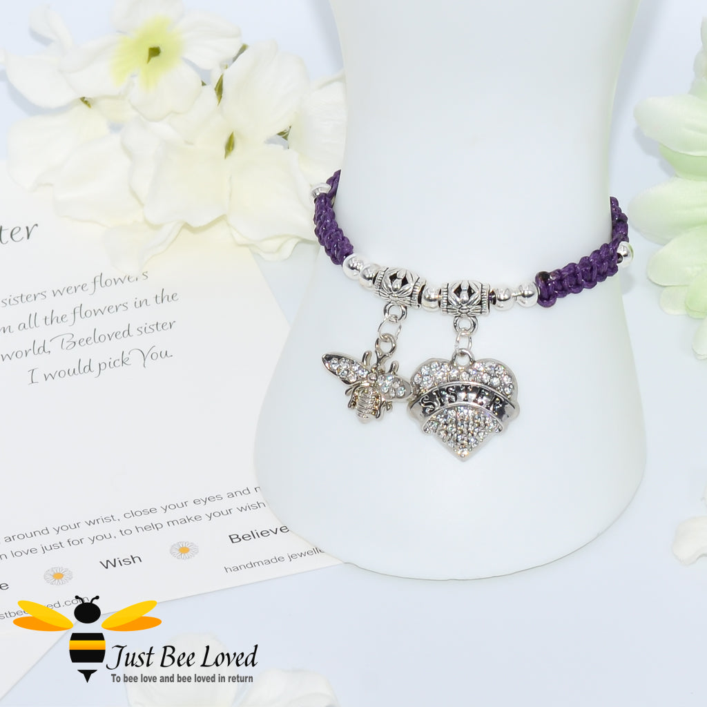 Purple Shamballa wish bracelet featuring a crystal bee and heart charm engraved with "Sister" and a sister verse card.