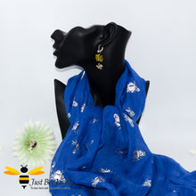 Load image into Gallery viewer, ladies scarf featuring metallic silver bumble bee print in royal blue colour, gift boxed with crystal silver bee brooch.